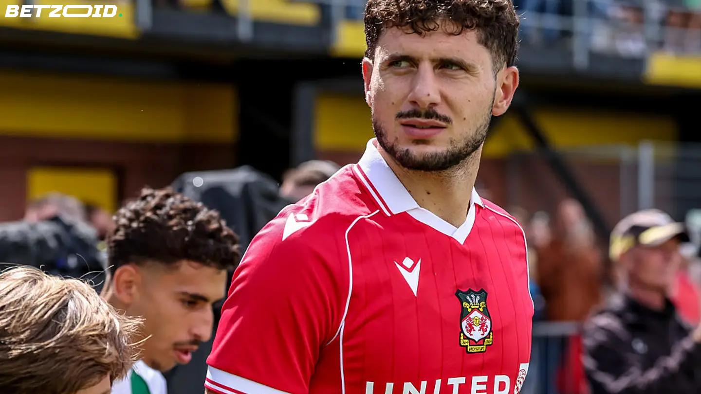 Cacace Determined to Repay Wrexham's Faith Following Injury-Plagued Debut Campaign